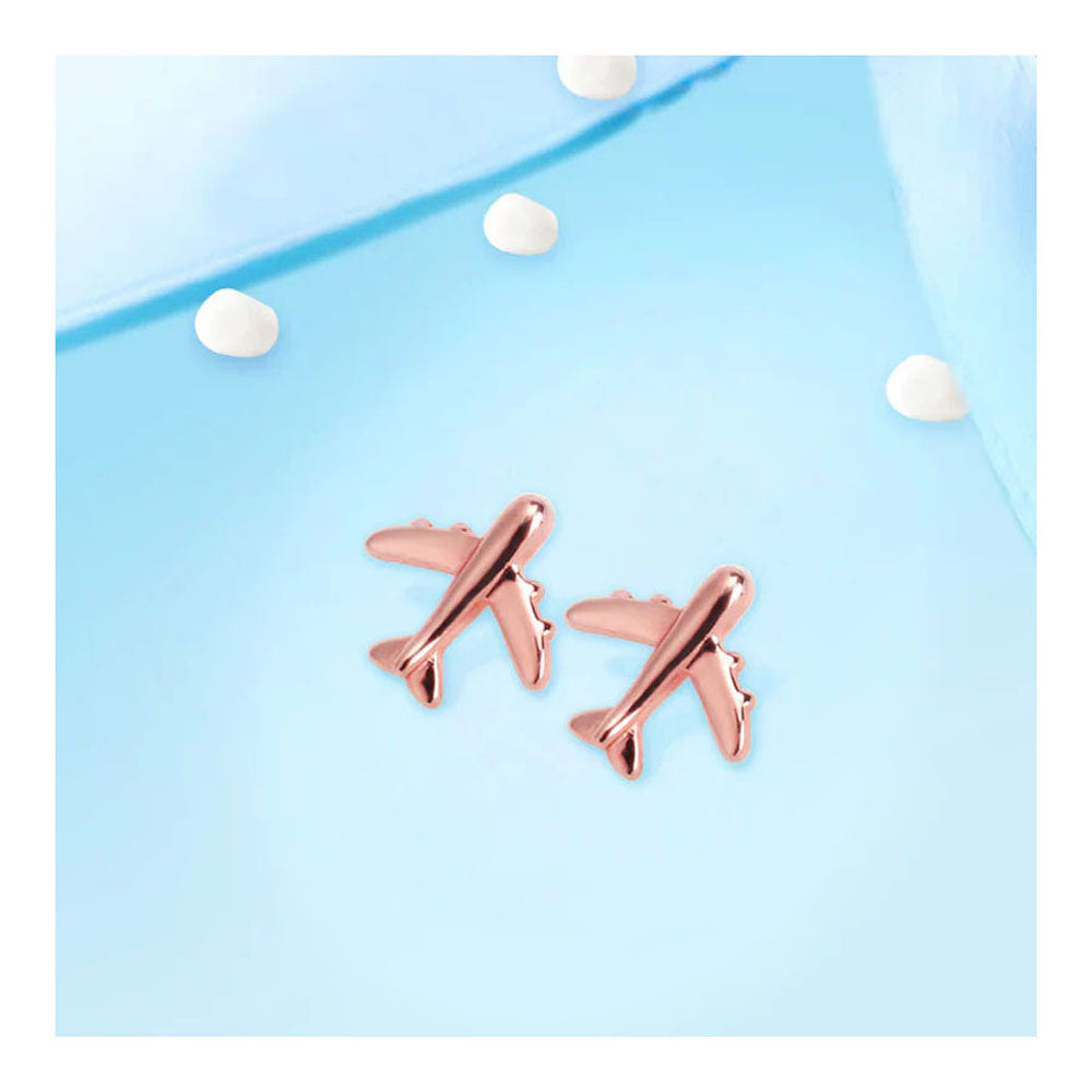 pair of airplane earrings in rose gold